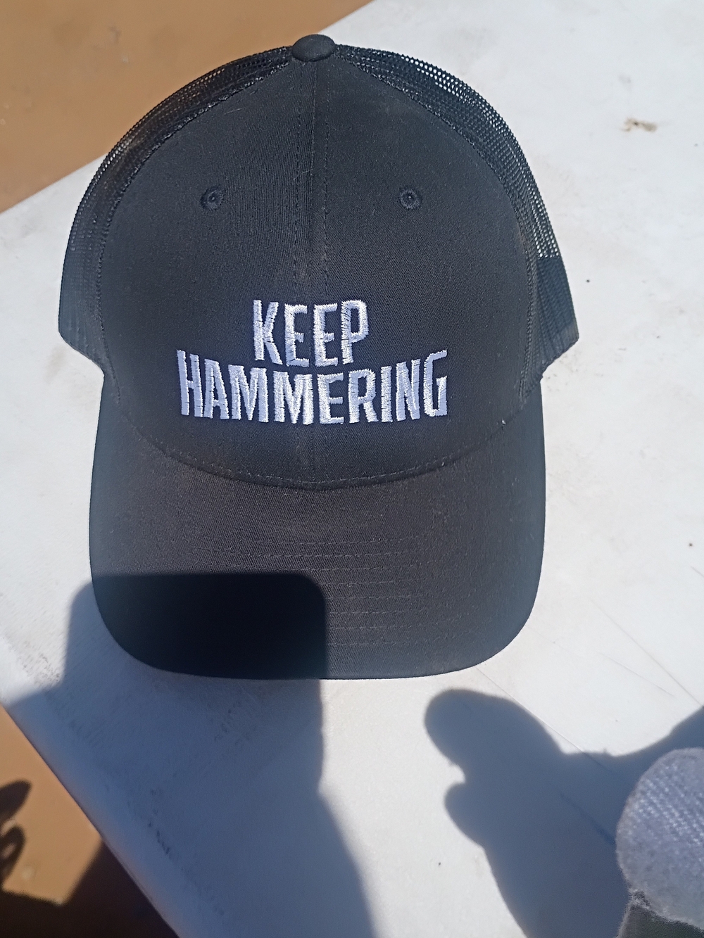 Black 'Keep Hammering' Trucker Hat